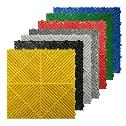 Modular garage floor tiles in yellow, black, white, grey, red, green and blue